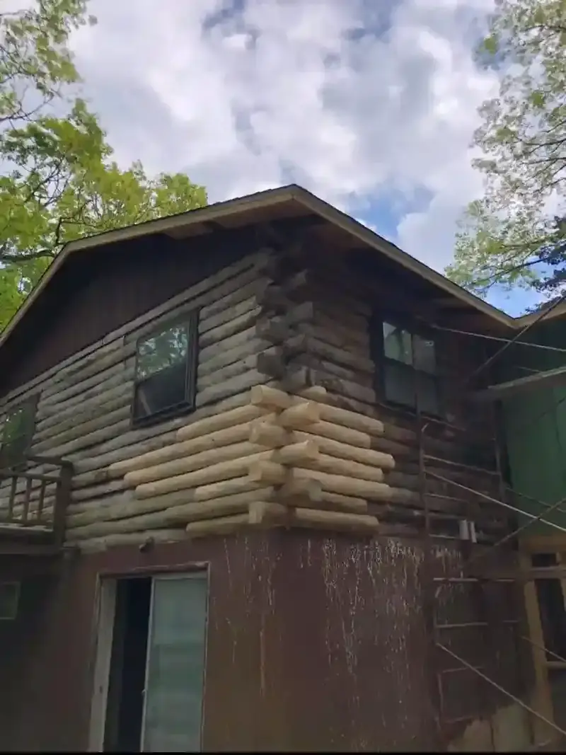 Rotted log replacement on a Missouri cabin by Nye Builders